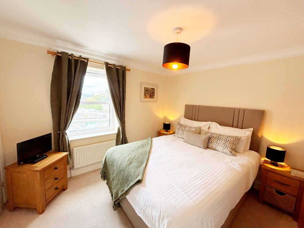 2, The Riviera, Torquay - main bedroom with views over the harbour, marina and seafront.