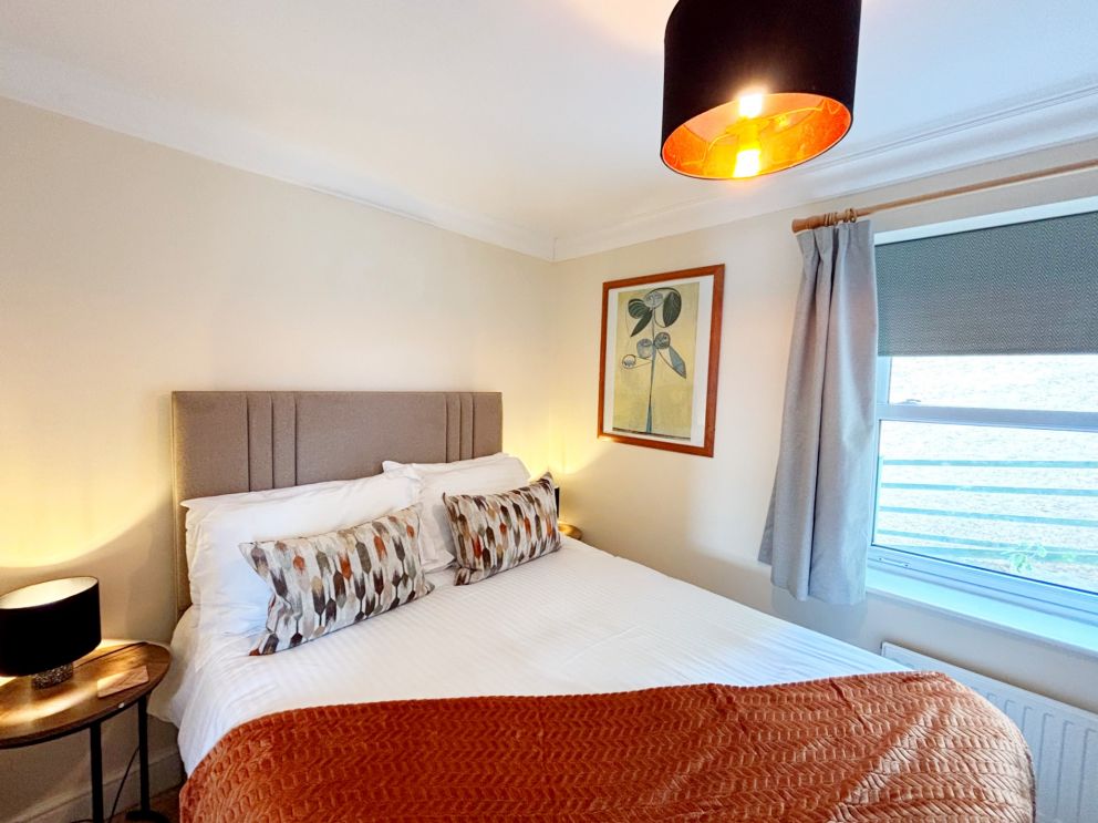 2, The Riviera, Torquay. Second bedroom with standard double bed.
