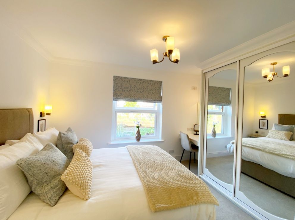 The main bedroom at The Degas Suite - the Corbyn Apartments in Torquay