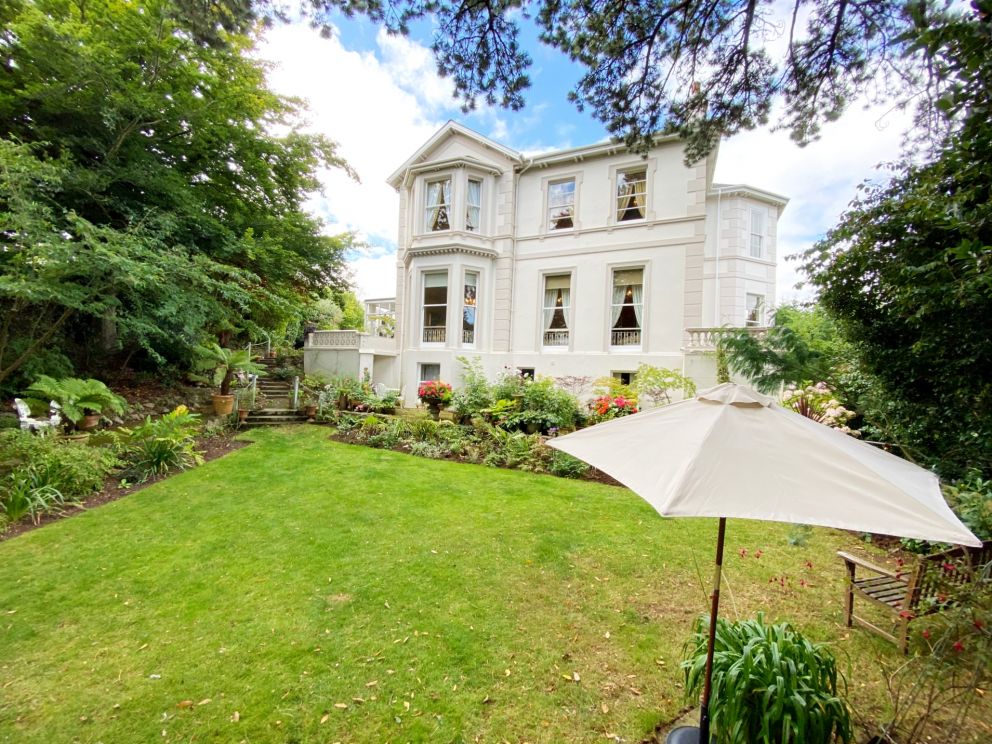 The Muntham Luxury Self Catering Holiday Apartments in Torquay - Rose Garden at the side of the property. Apartment 2 overlooks the garden.