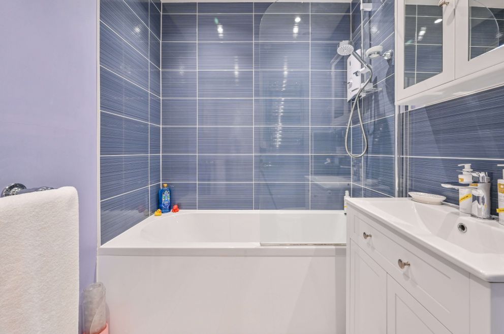 Apartment 6 - Bathroom has bath with shower over. The Muntham Luxury Holiday Apartments in Torquay