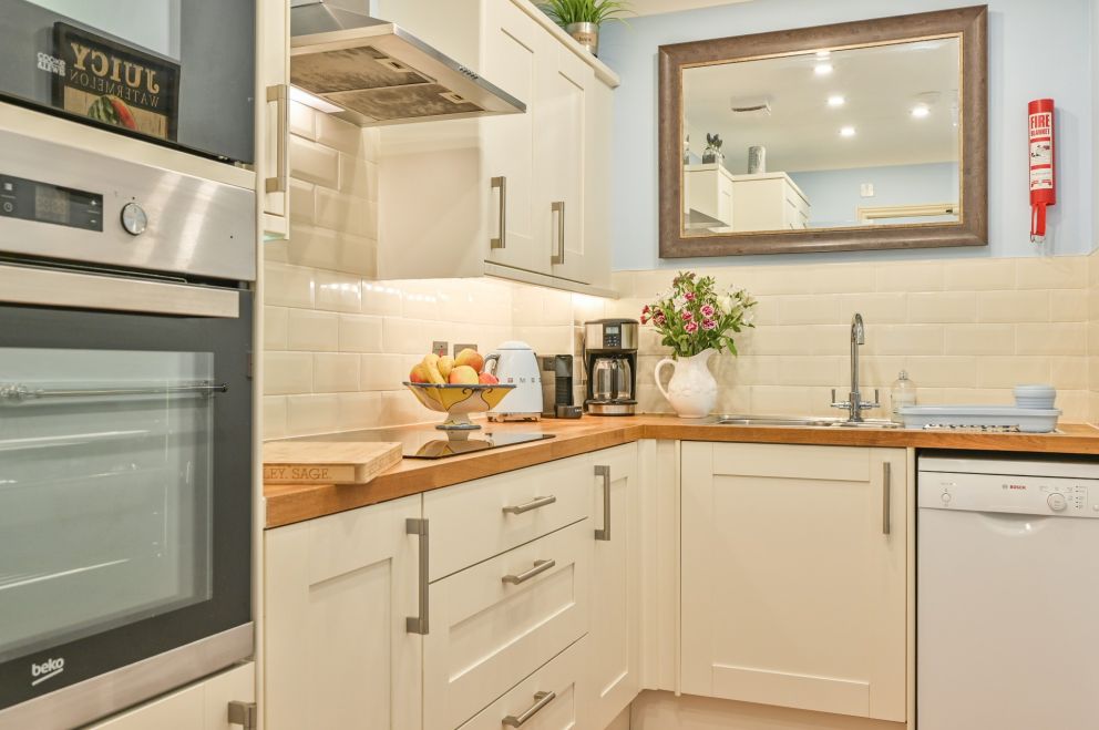 Apartment 3, The Muntham Luxury Holiday Apartments in Torquay. Well equipped modern kitchen.
