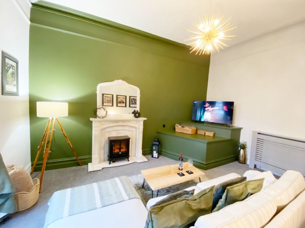 Living room with flame effect fire - Apartment B, Redcliffe Apartments, Torquay.