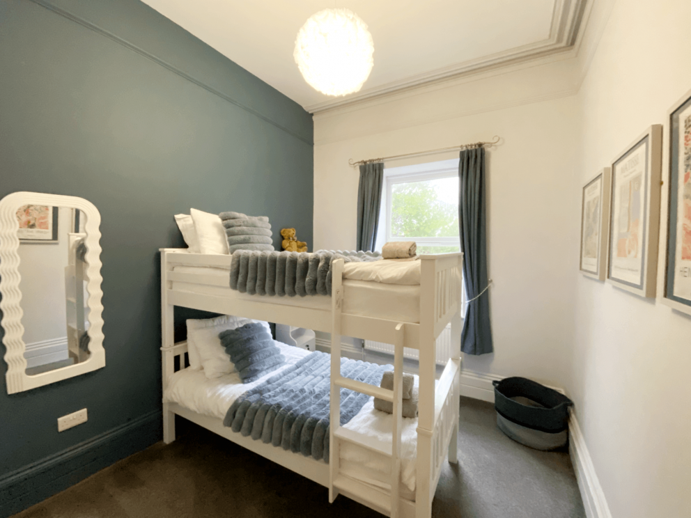 Redcliffe Apartment B - second bedroom with bunk beds.