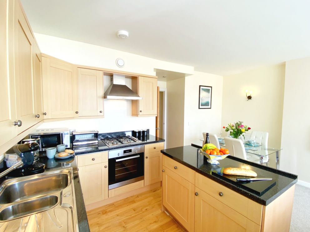 Sea View Apartment, 7 Ellington Court, Torquay - modern kitchen with dining area.