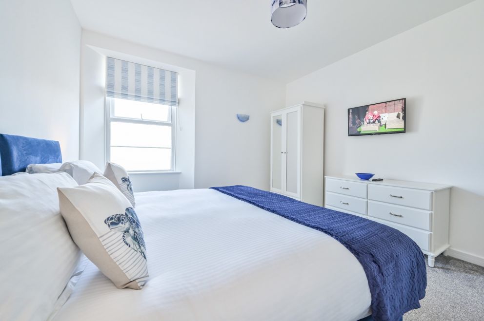 The Falstone Holiday Apartment in St Marychurch - second bedroom- comfortable bed.