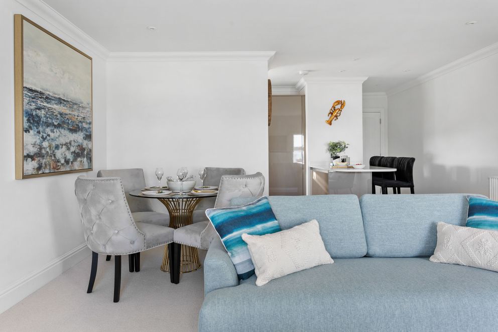 Spacious living space with dining area - Sea View Suite, The Corbyn Apartments.